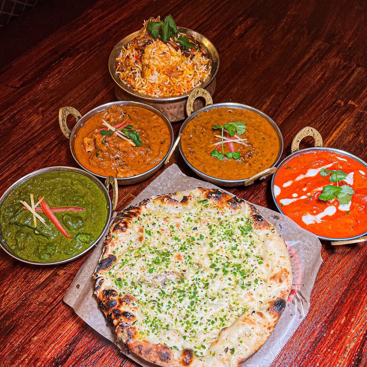 Taj Palace Indian Cuisine signature dishes Chicken KormaLamb SaagAloo Gobi